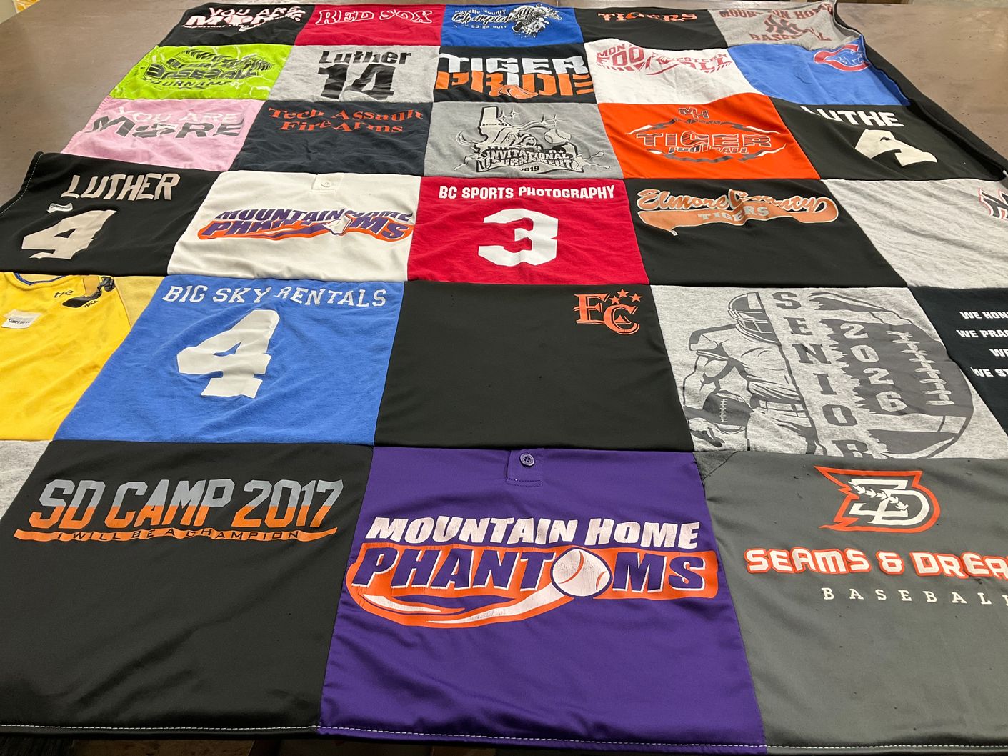 T-shirt quilt featuring mountain home phantoms, elmira college tigers by Christine from ID