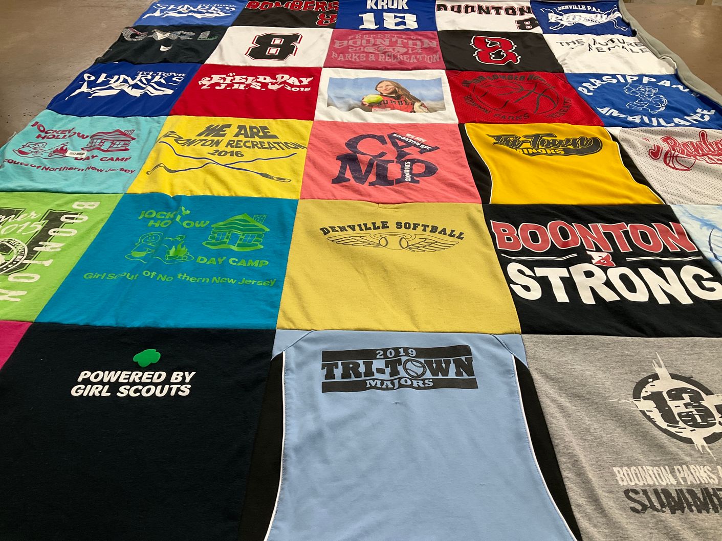 T-shirt quilt with camping, softball themes by Jennifer from NJ