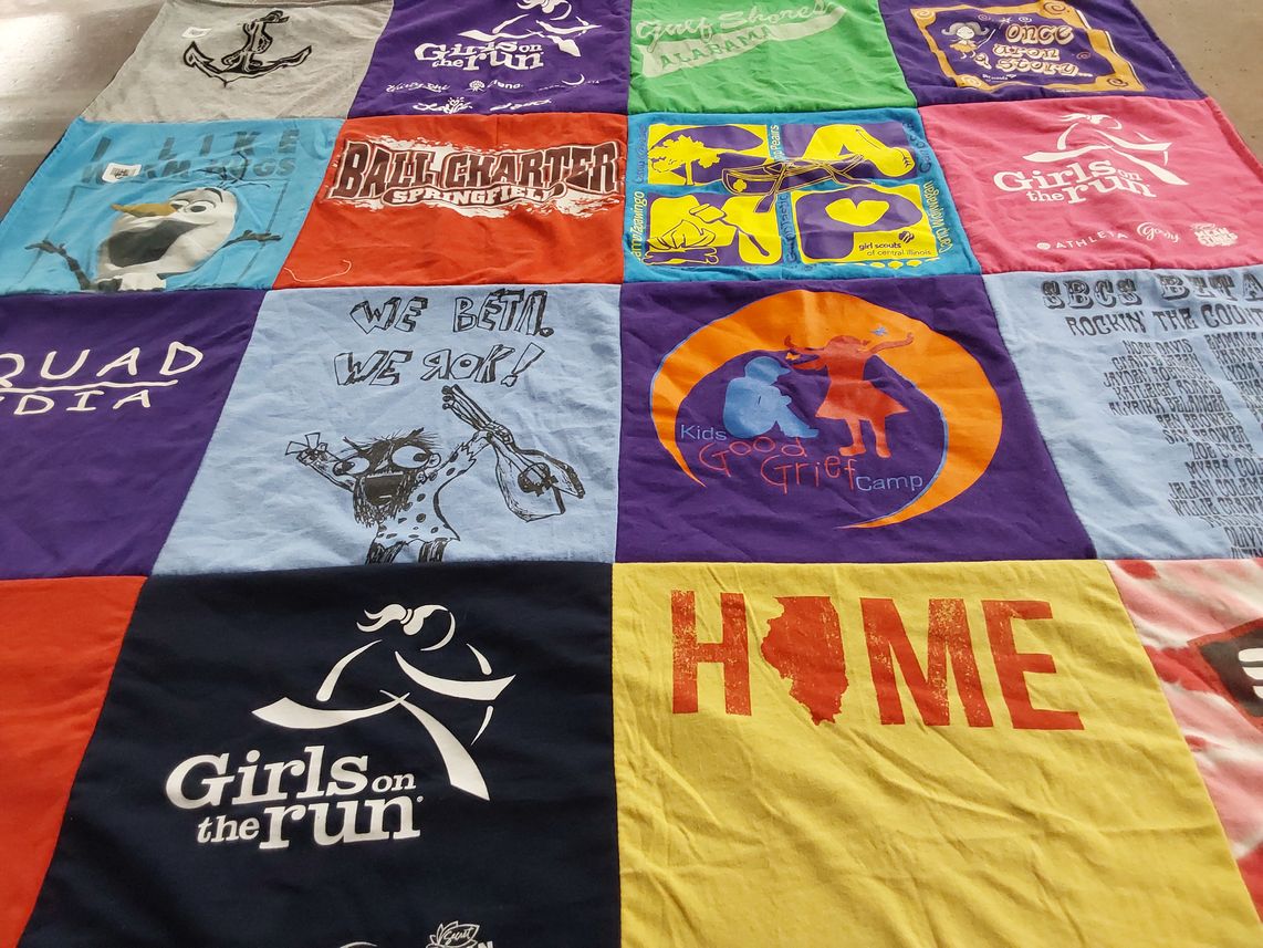 T-shirt quilt with community, children's activities themes by Nicole from IL