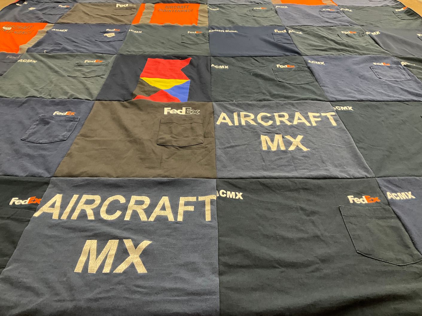 T-shirt quilt with aviation, shipping themes by John from TN