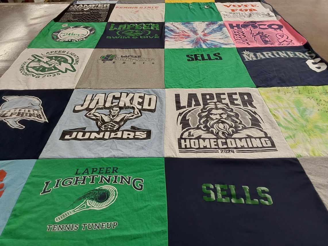 T-shirt quilt featuring lapeer lightning, lapeer swim & dive by Gretchen from MI