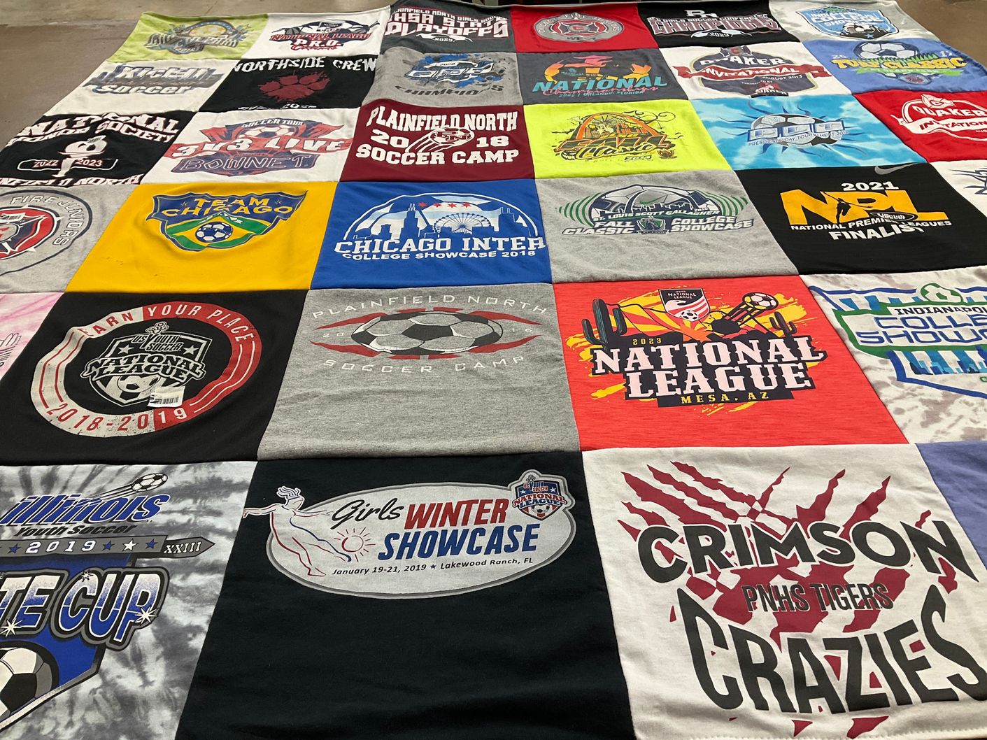 T-shirt quilt featuring crimson crazies by Elisa from IL
