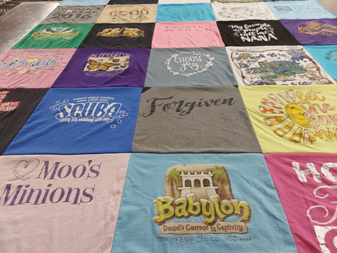 T-shirt quilt with children's ministry, bible study themes by Laurie from TX