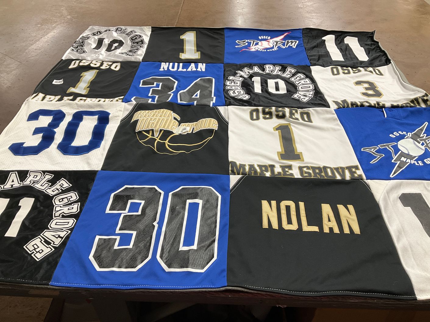 T-shirt quilt featuring osseo storm by Emily from MN