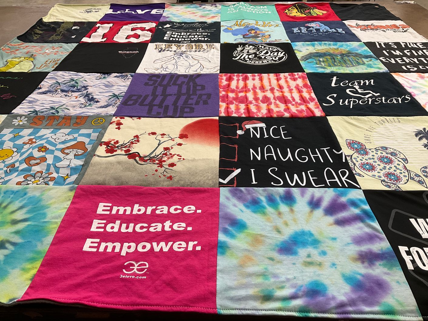 T-shirt quilt with personal development, environmentalism themes by Keren from IL