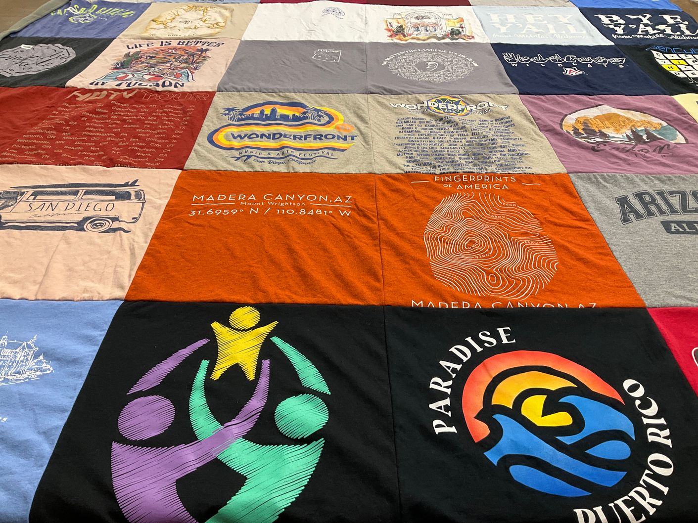 T-shirt quilt with travel, music themes by Savannah from IL