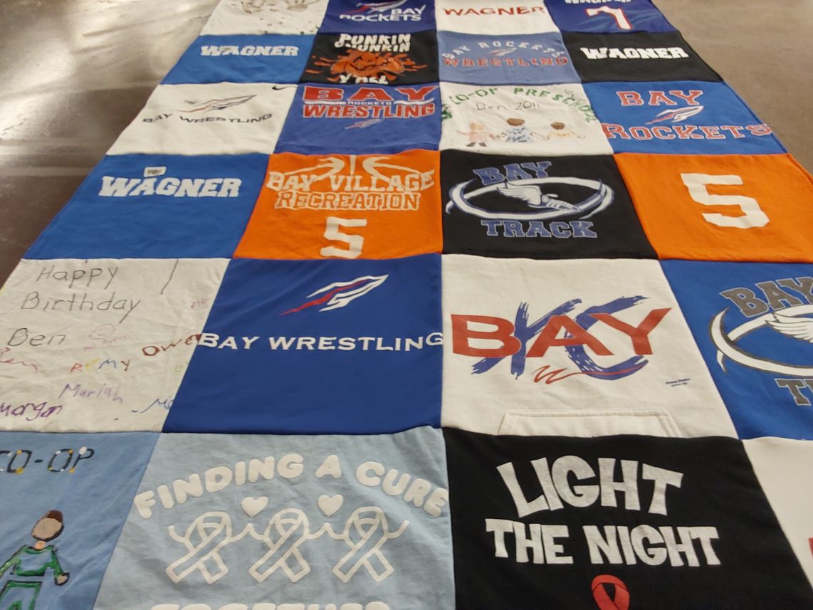 T-shirt quilt featuring bay rockets, bay wrestling by Julie from OH