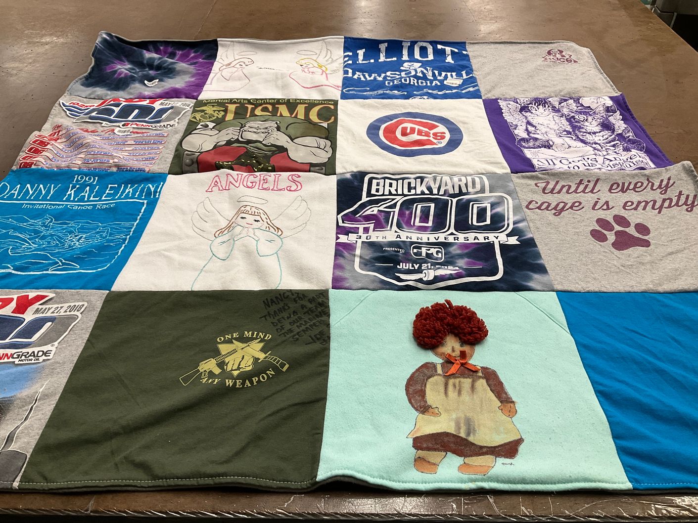 T-shirt quilt with animal arts, racing themes by Nancy from IN