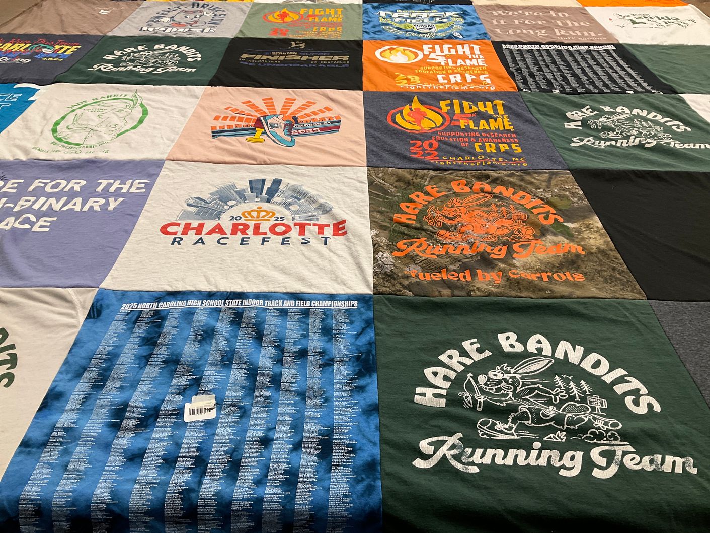 T-shirt quilt with running, track and field themes by Storm from NC