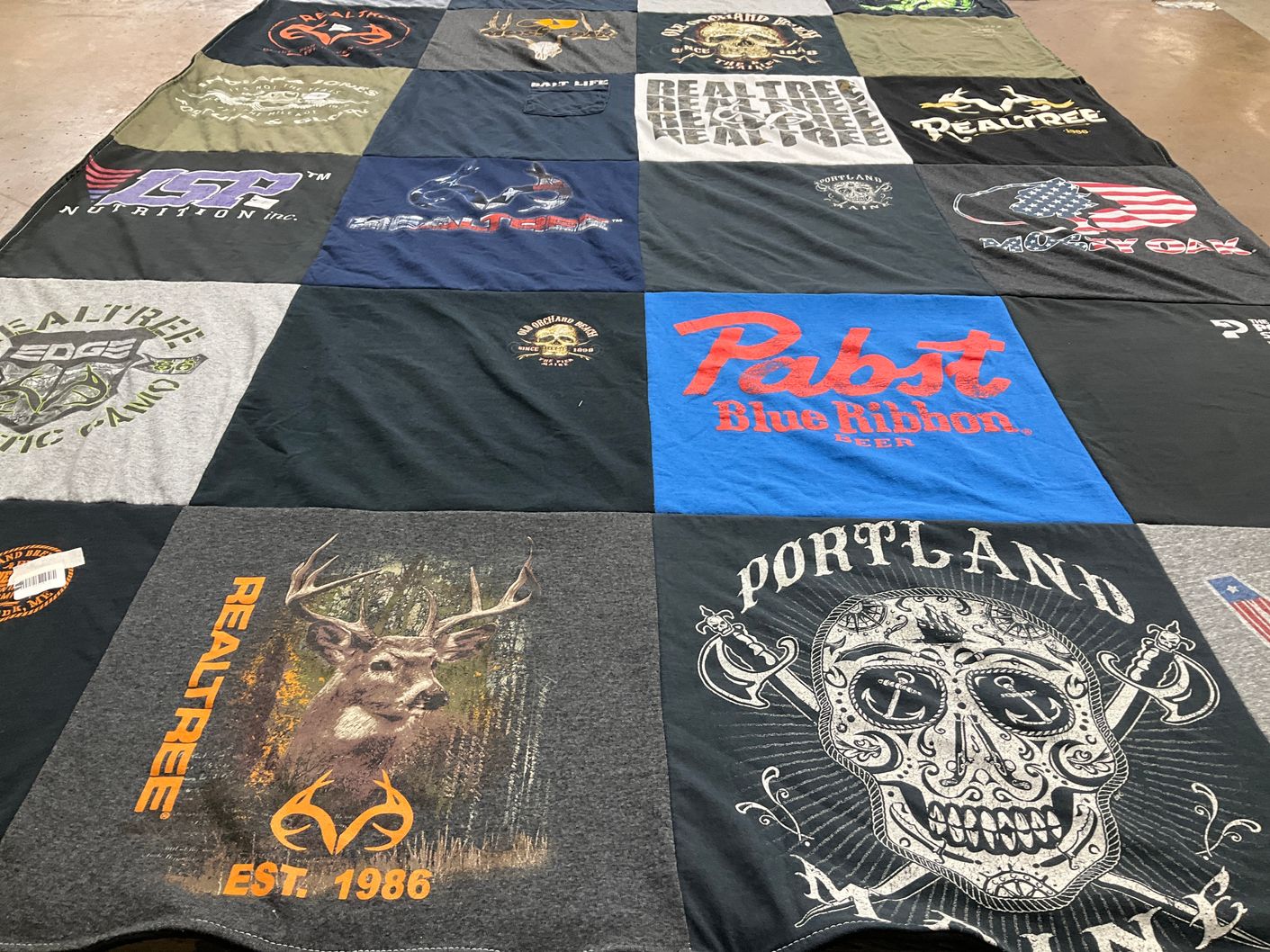 T-shirt quilt with hunting, outdoors themes by L from NJ