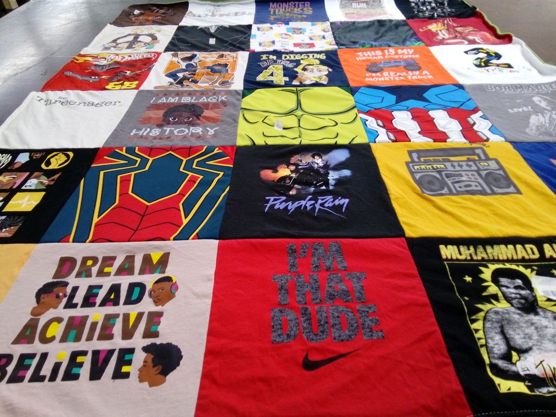T-shirt quilt with history, music themes by Brandi from NC