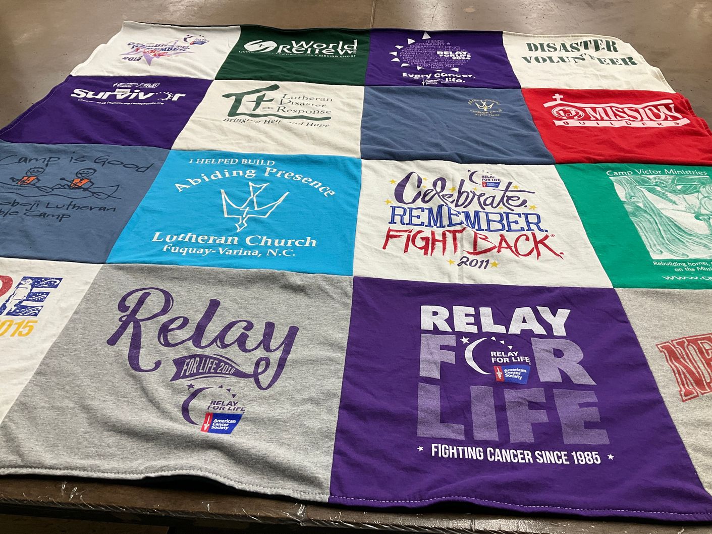 T-shirt quilt with charity, cancer awareness themes by Vivian from NC