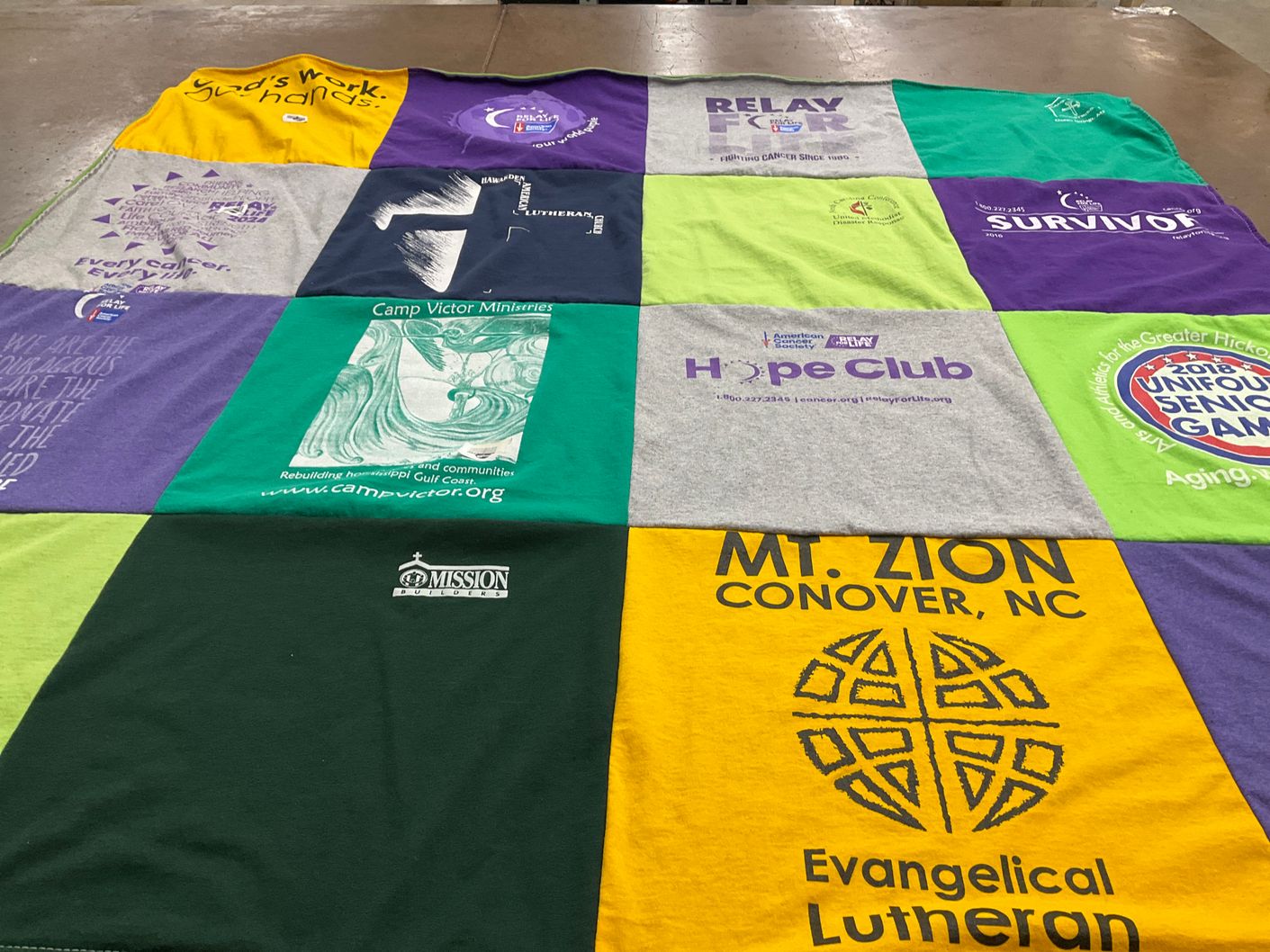 T-shirt quilt with cancer awareness, community service themes by Sharon from NC