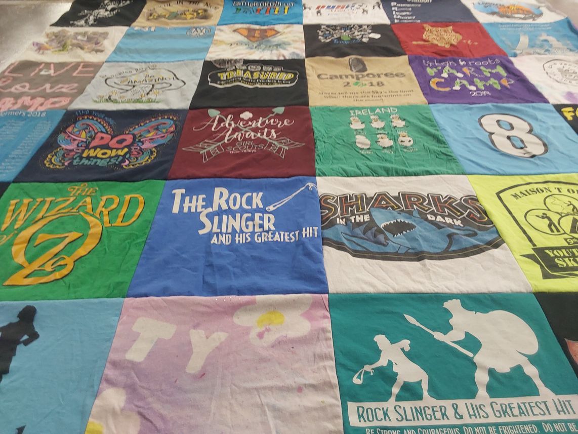T-shirt quilt with theater, camping themes by Michelle from OR