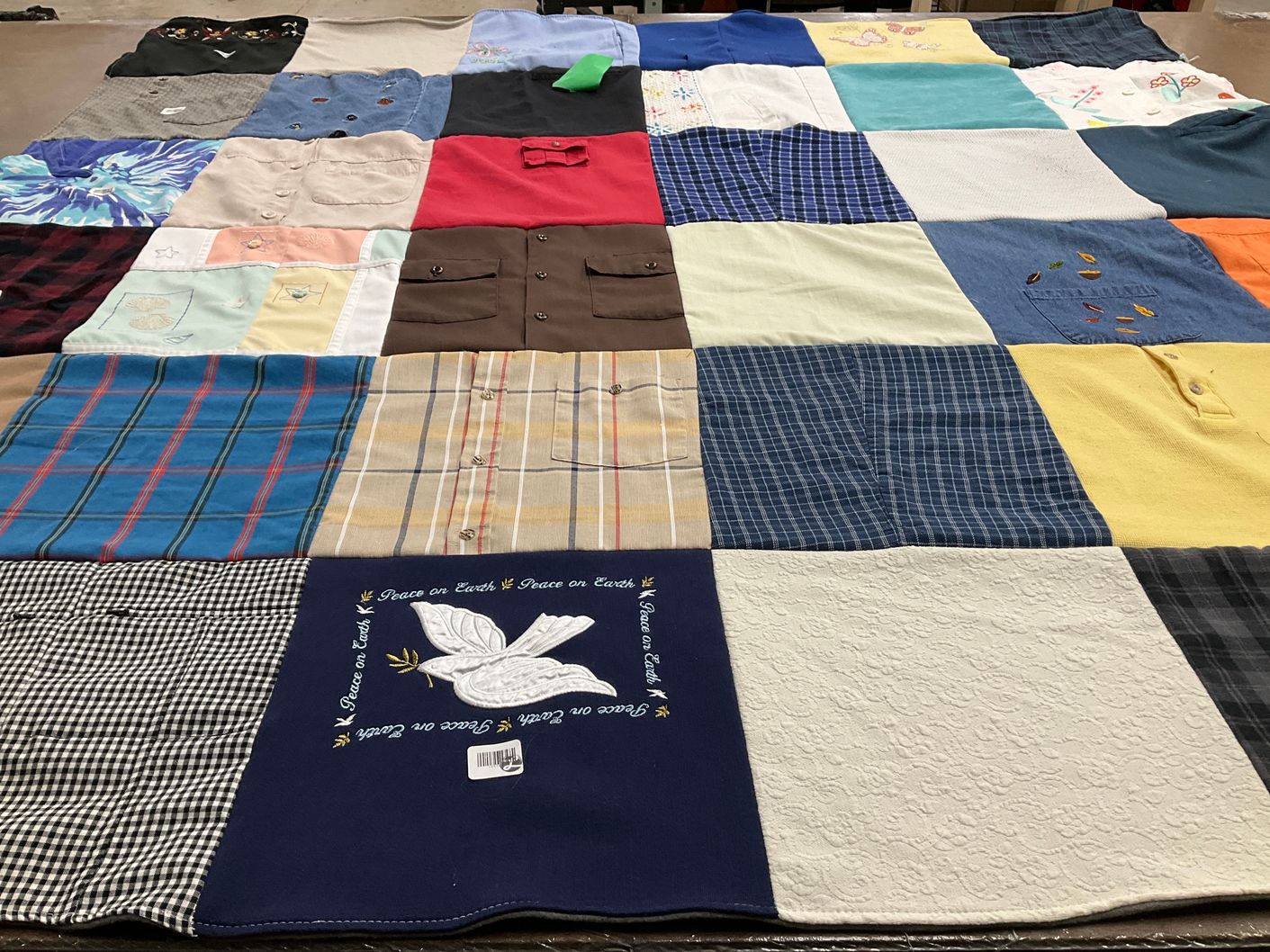 T-shirt quilt with quilting, embroidery themes by Stacia from SD