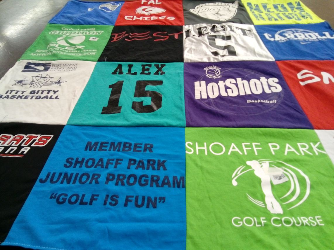 T-shirt quilt with basketball, golf themes by Denise from IN