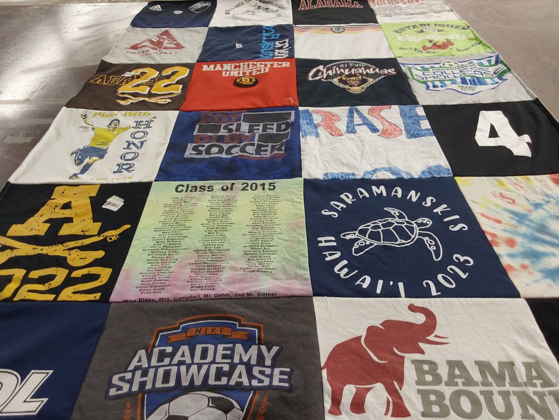 T-shirt quilt featuring united by Adelaide from MI