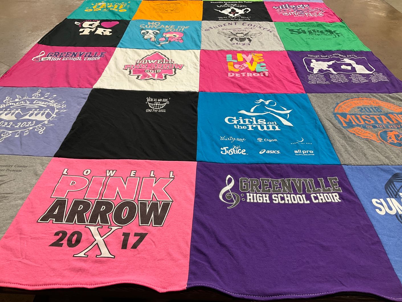 T-shirt quilt featuring lowell high school pink arrow by Andrea from MI