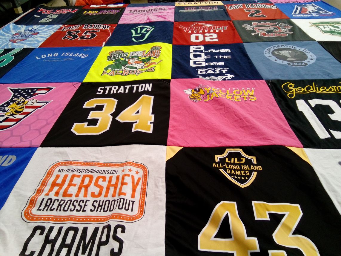 T-shirt quilt featuring yellow jackets, lady raiders by Lori from NY