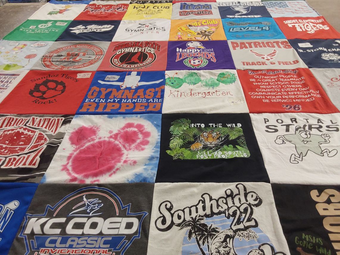T-shirt quilt featuring patriots, tigers by Marnell from IA