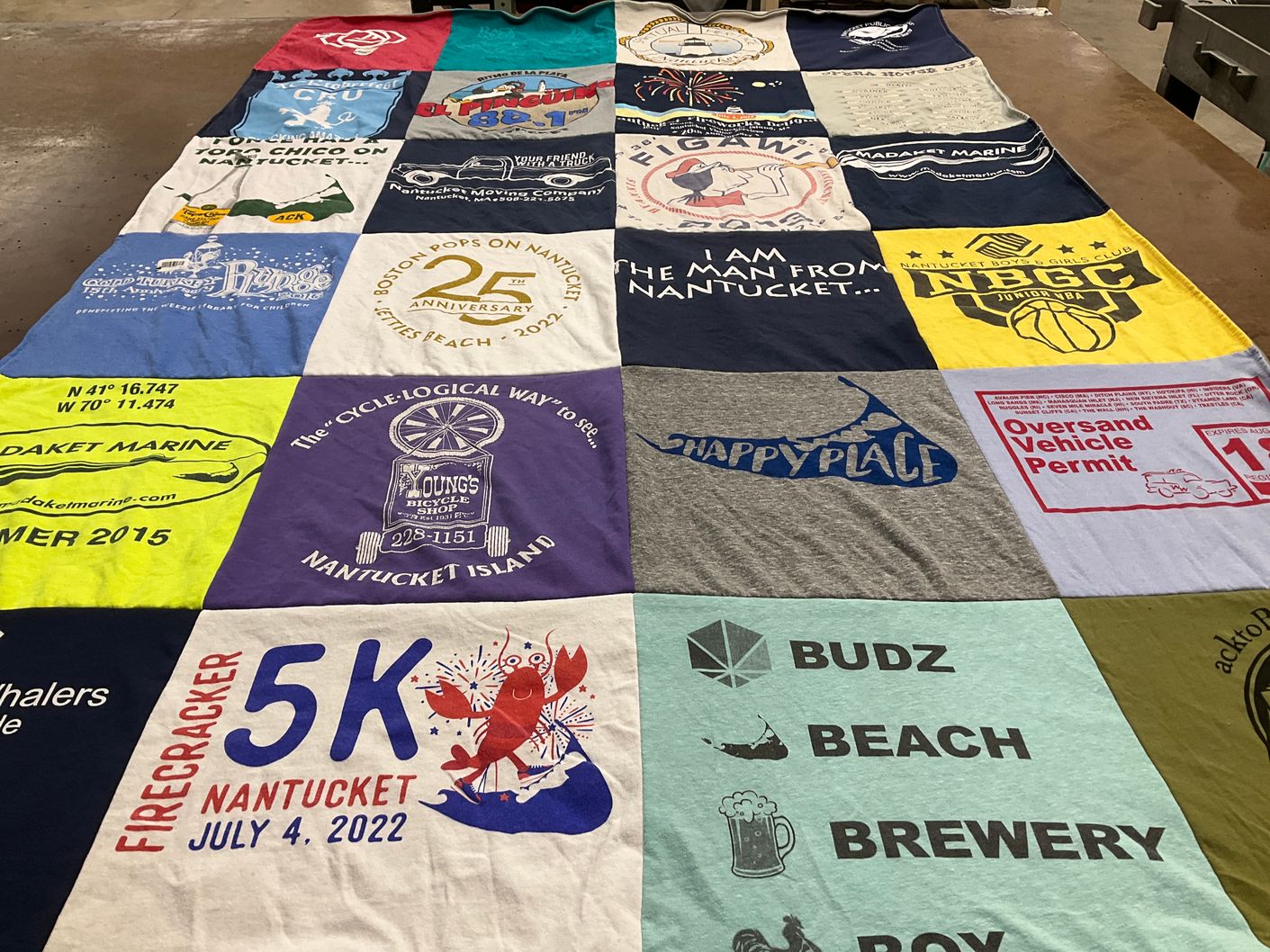 T-shirt quilt with local businesses, running events themes by Saralyn from NH