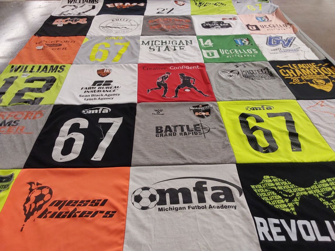 T-shirt quilt featuring michigan futbol academy by Catherine from MI