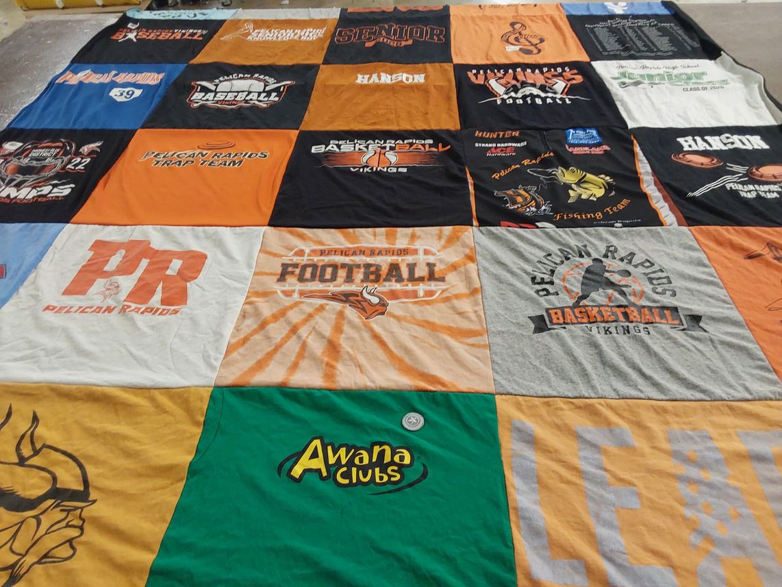 T-shirt quilt featuring pelican rapids viking football, pelican rapids viking basketball by Tami from MN