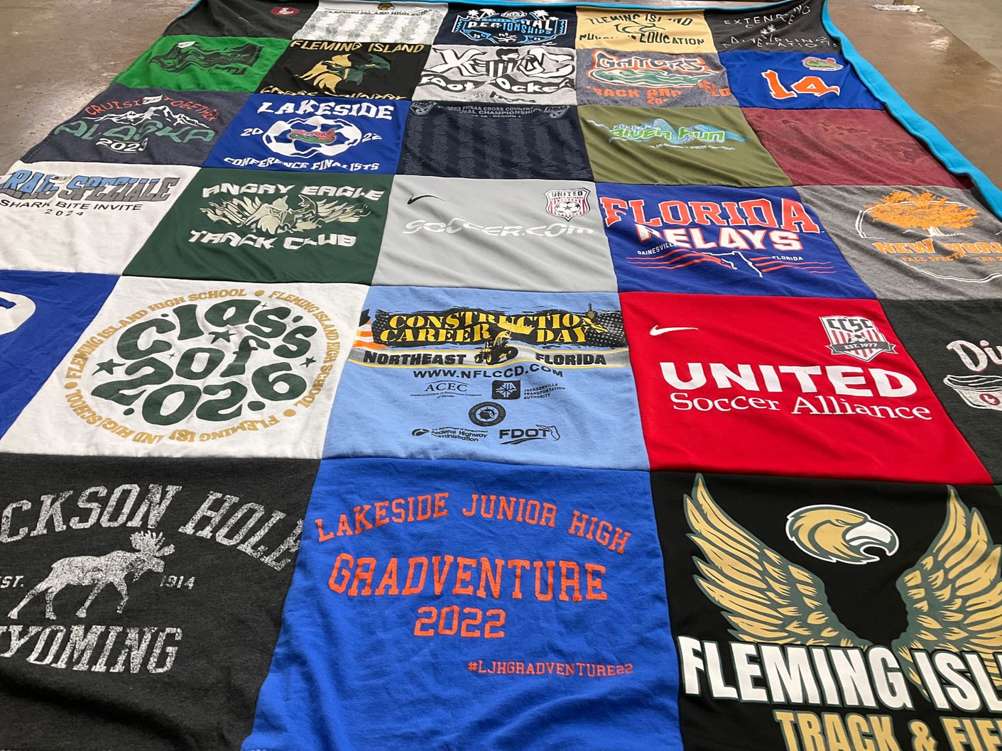 T-shirt quilt featuring fleming island track and field, fleming island soccer by Ellen from FL