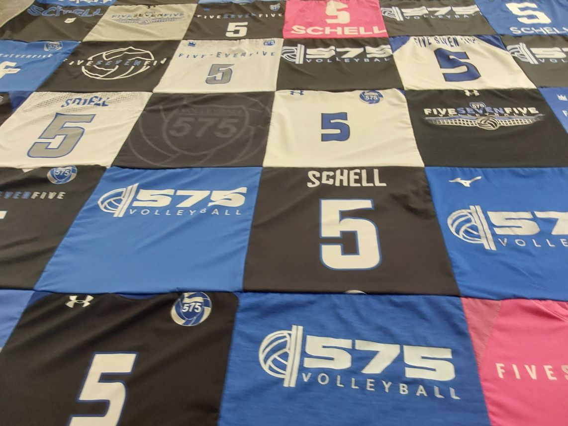 T-shirt quilt with volleyball themes by Laura from GA
