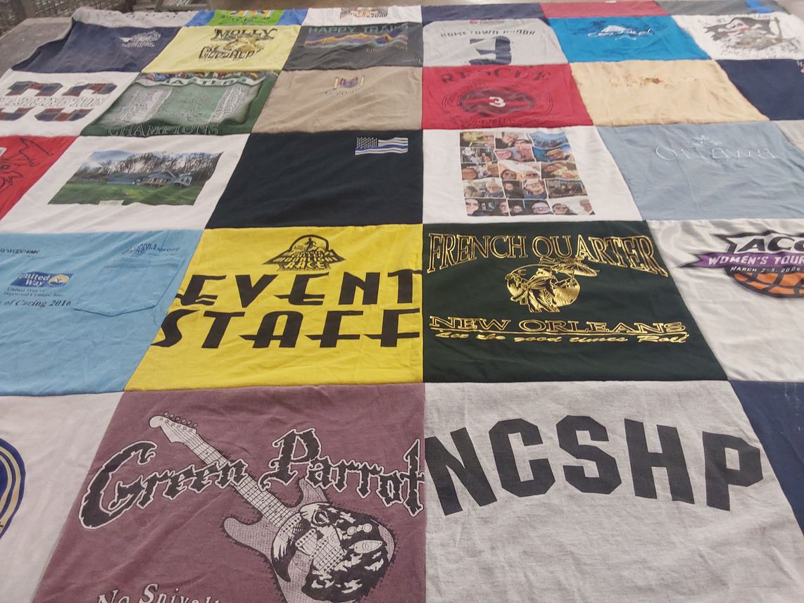 T-shirt quilt with music, events themes by Elizabeth from NC