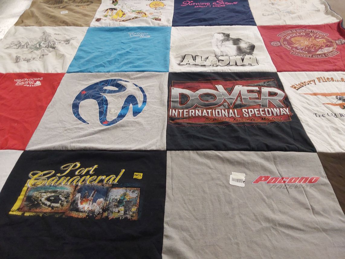 T-shirt quilt with racing, travel themes by Lisa from NY