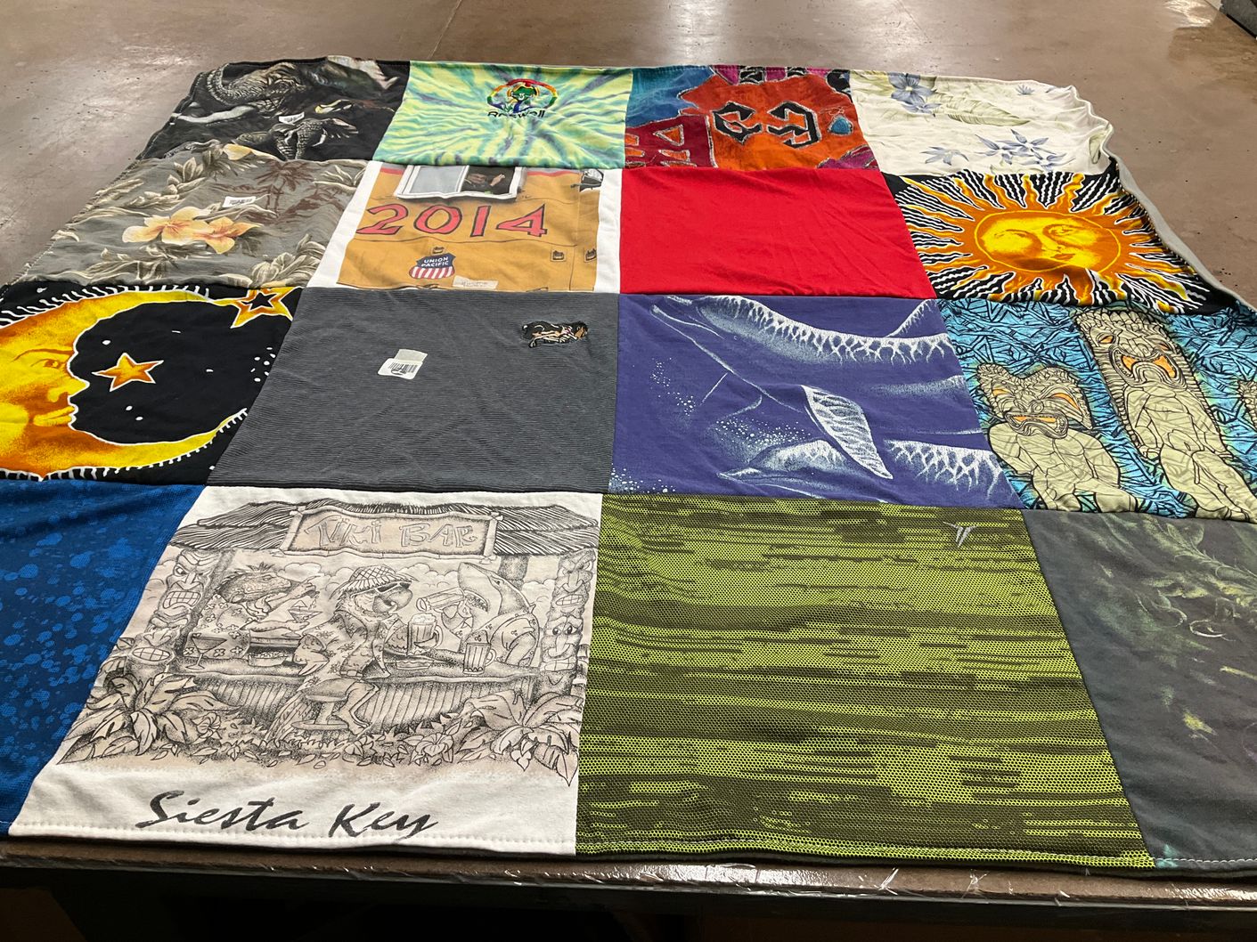 T-shirt quilt with travel, beach themes by Laura from KS