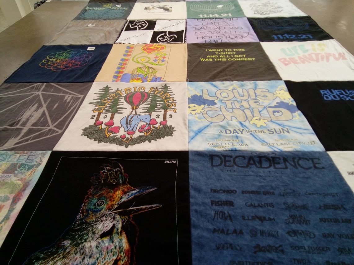 T-shirt quilt with music, concerts themes by Anne Marie from CO