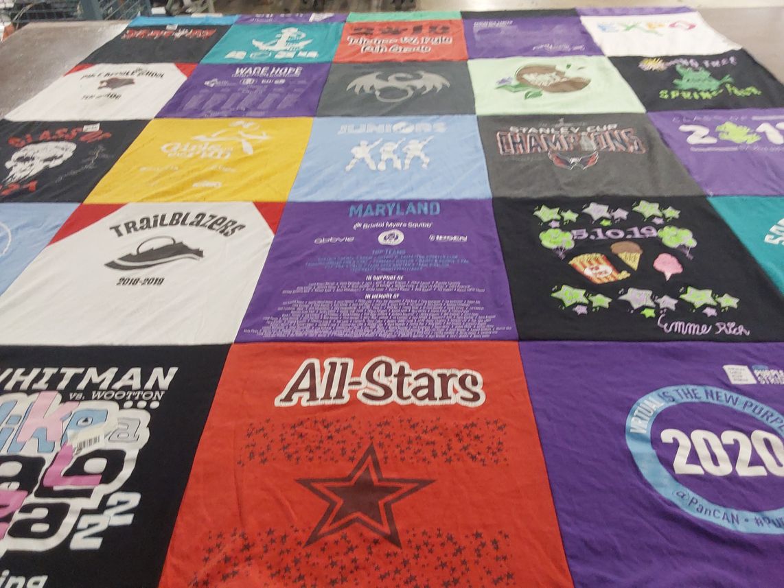 T-shirt quilt featuring trailblazers by Achara from MD