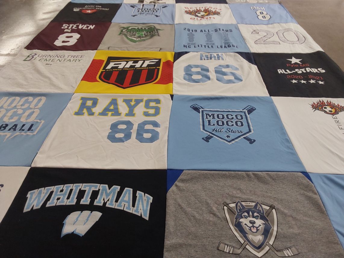 T-shirt quilt featuring moco loco all stars, mc little league by Achara from MD
