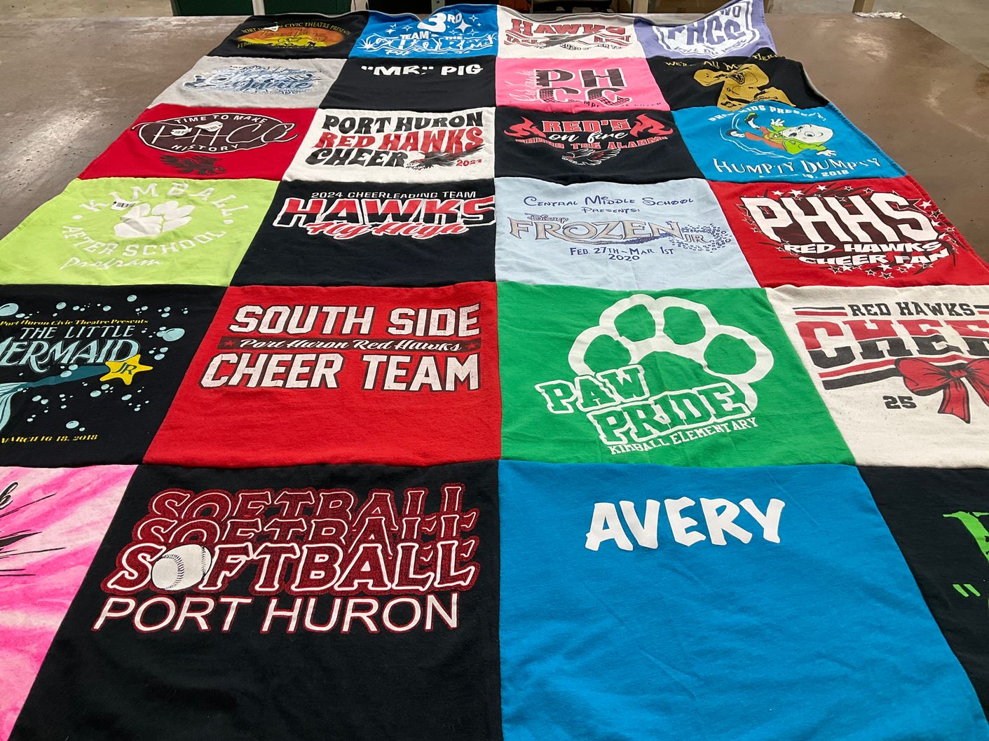 T-shirt quilt featuring red hawks cheer team by Deanna from MI