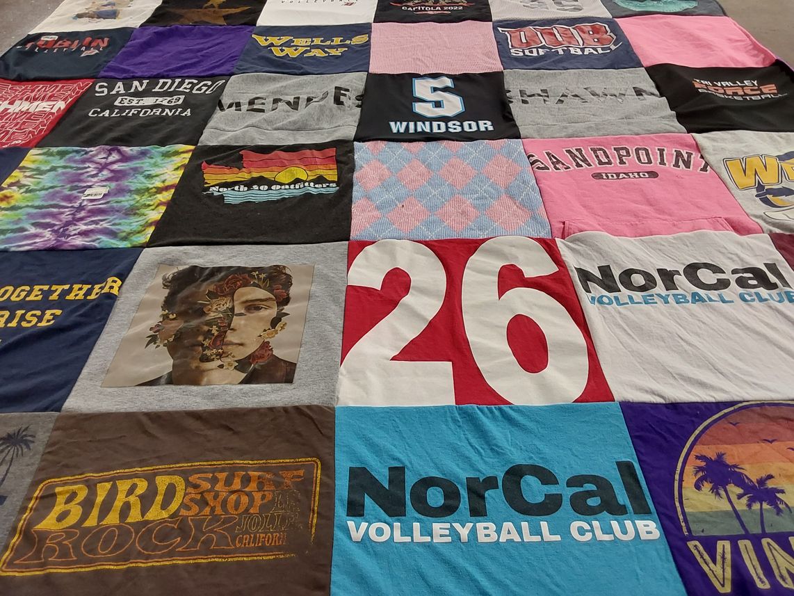 T-shirt quilt with volleyball, softball themes by Kim from CA