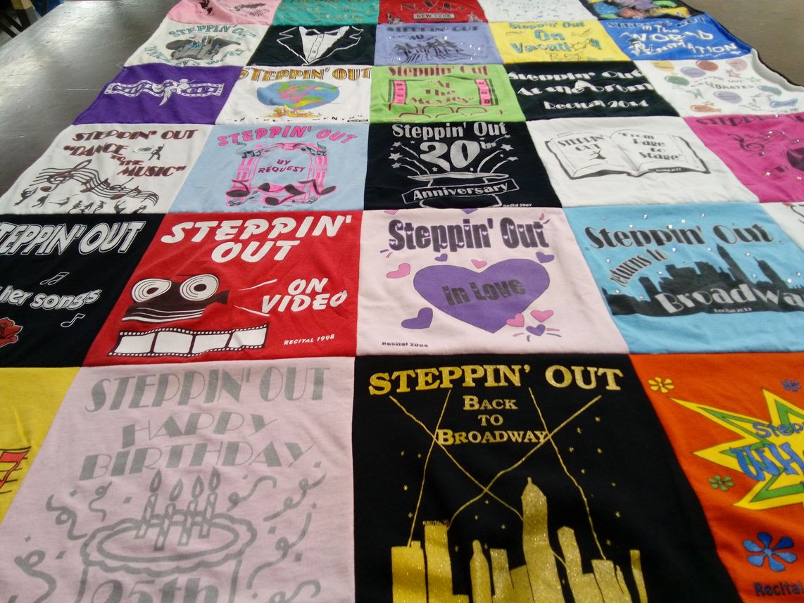 T-shirt quilt with theater, music themes by Jeannine from CT