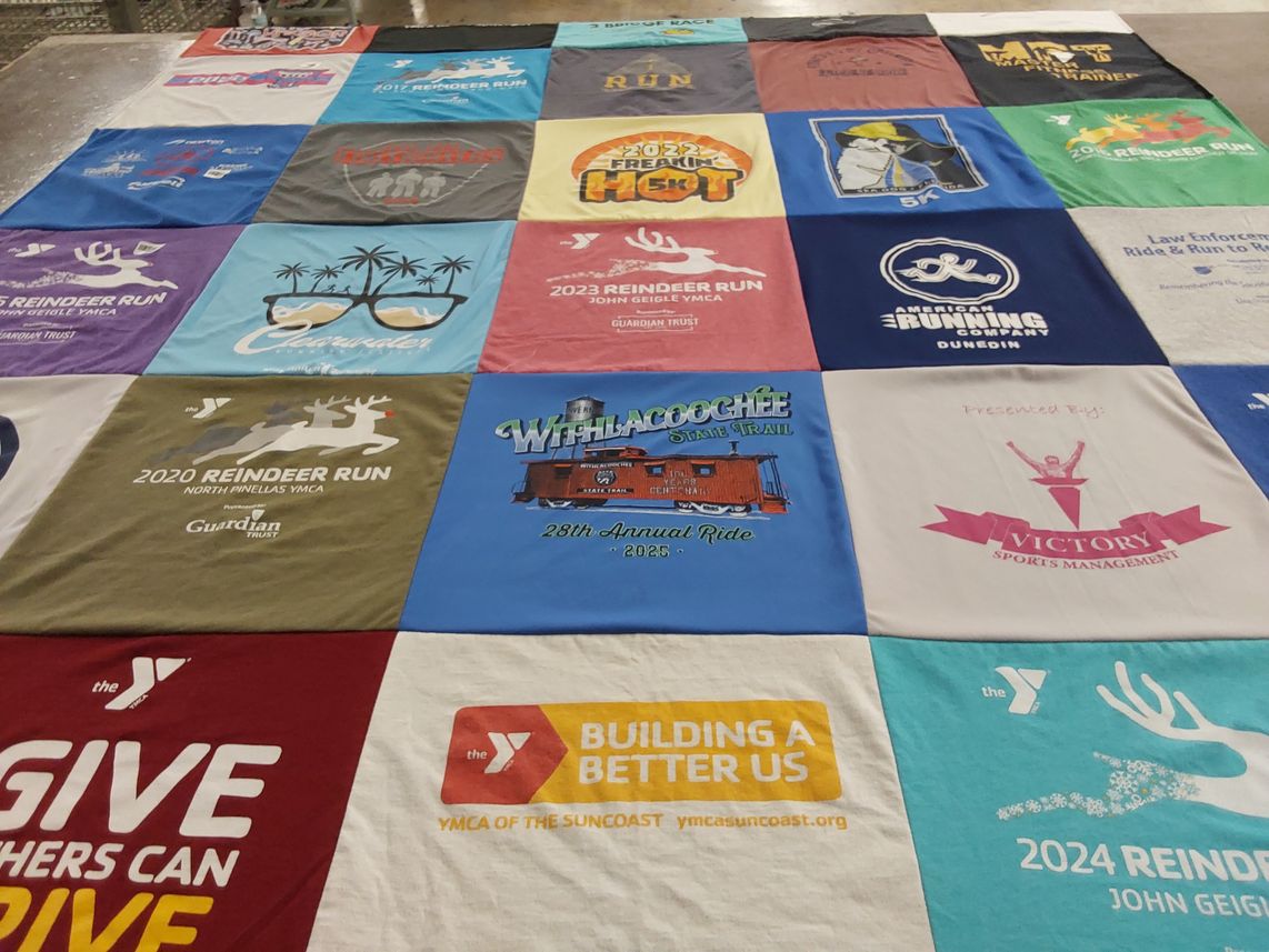 T-shirt quilt with running, community events themes by Aldelmo from FL