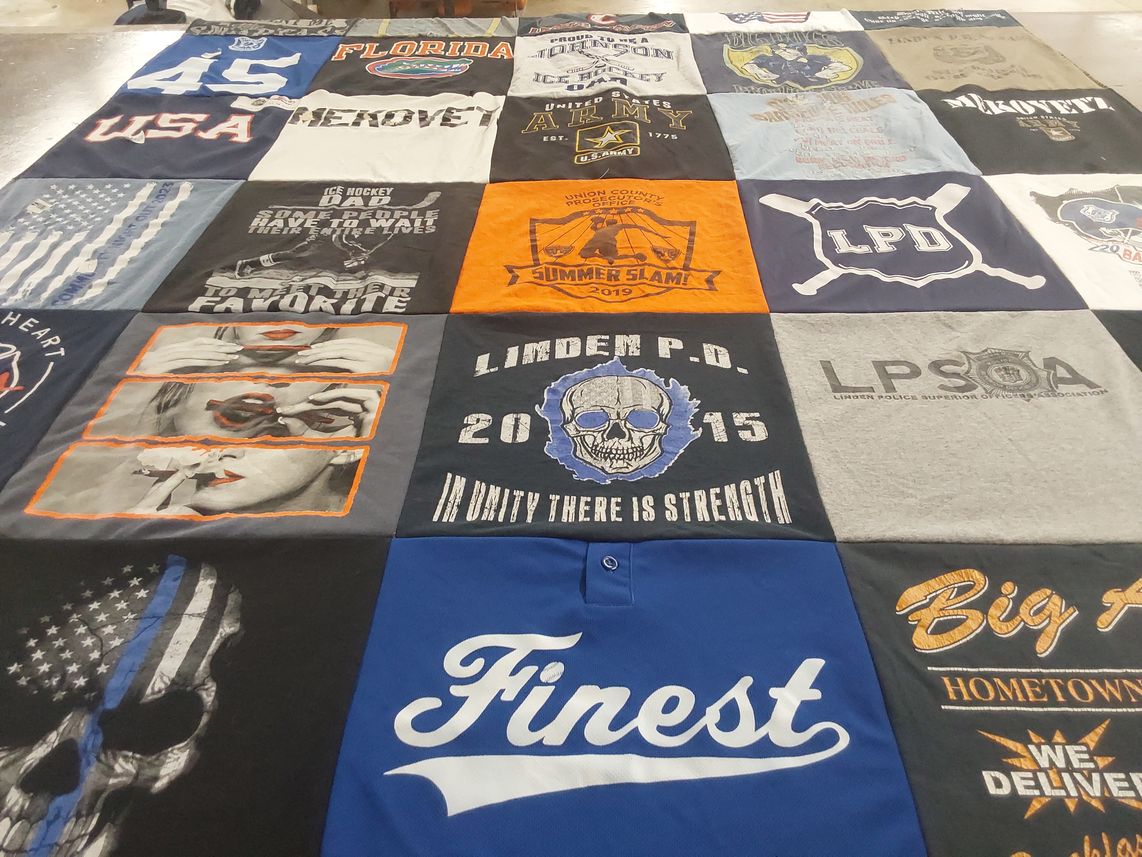 T-shirt quilt with hockey, police themes by John from NJ
