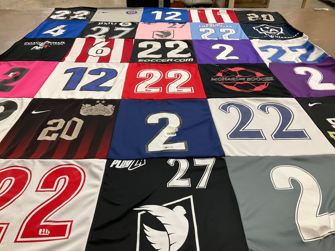 T-shirt quilt with soccer themes by Betty from CA