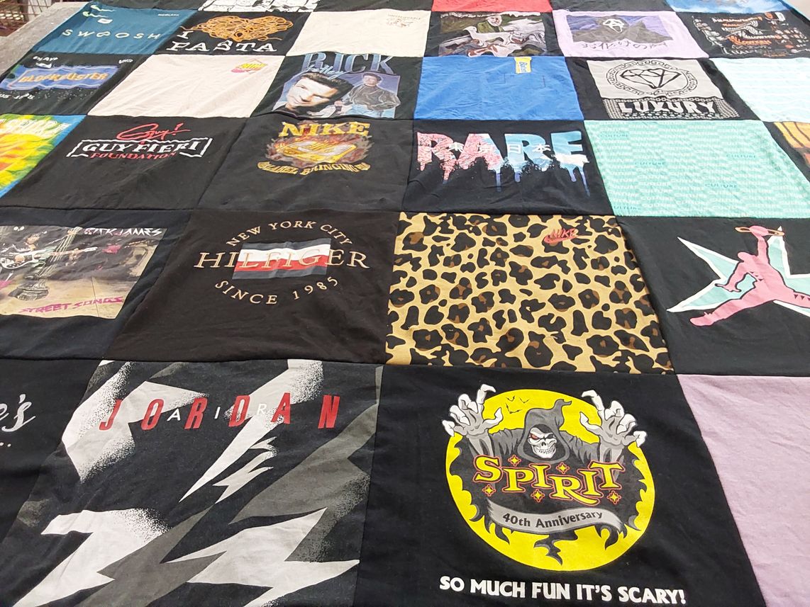 T-shirt quilt with fashion, music themes by Susan from NJ