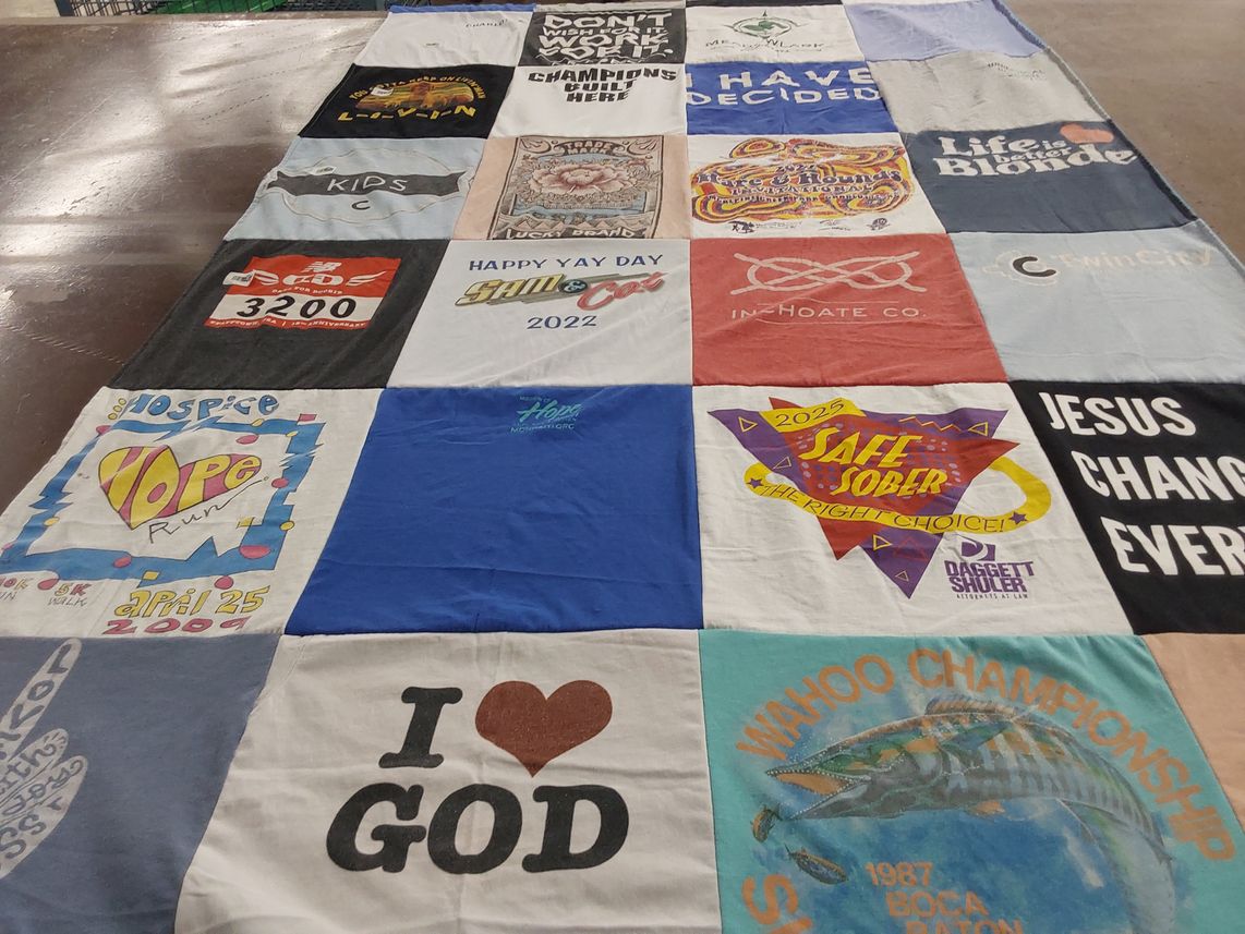 T-shirt quilt with running, sports themes by Don from NC