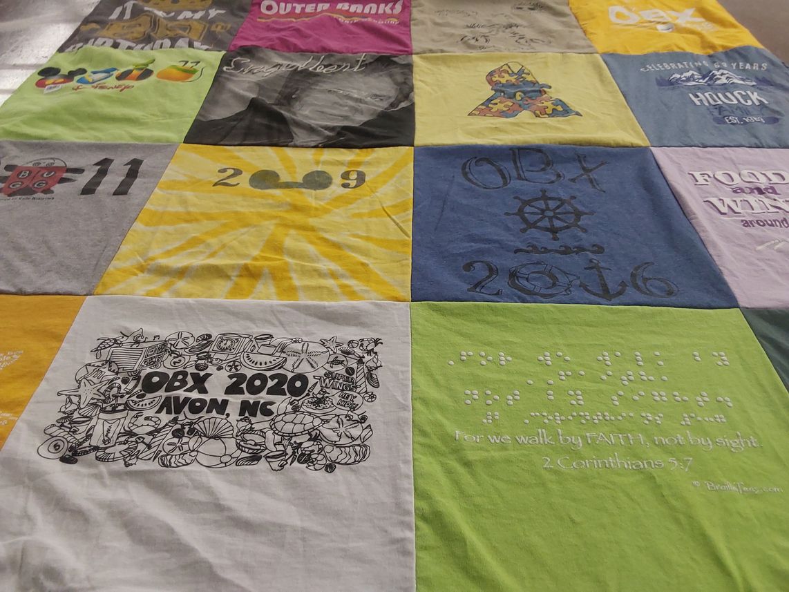 T-shirt quilt with beach, community themes by Laura from CT