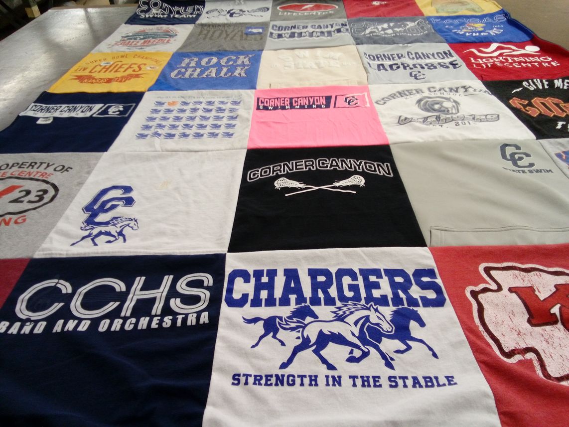 T-shirt quilt featuring corner canyon chargers by Emily from UT