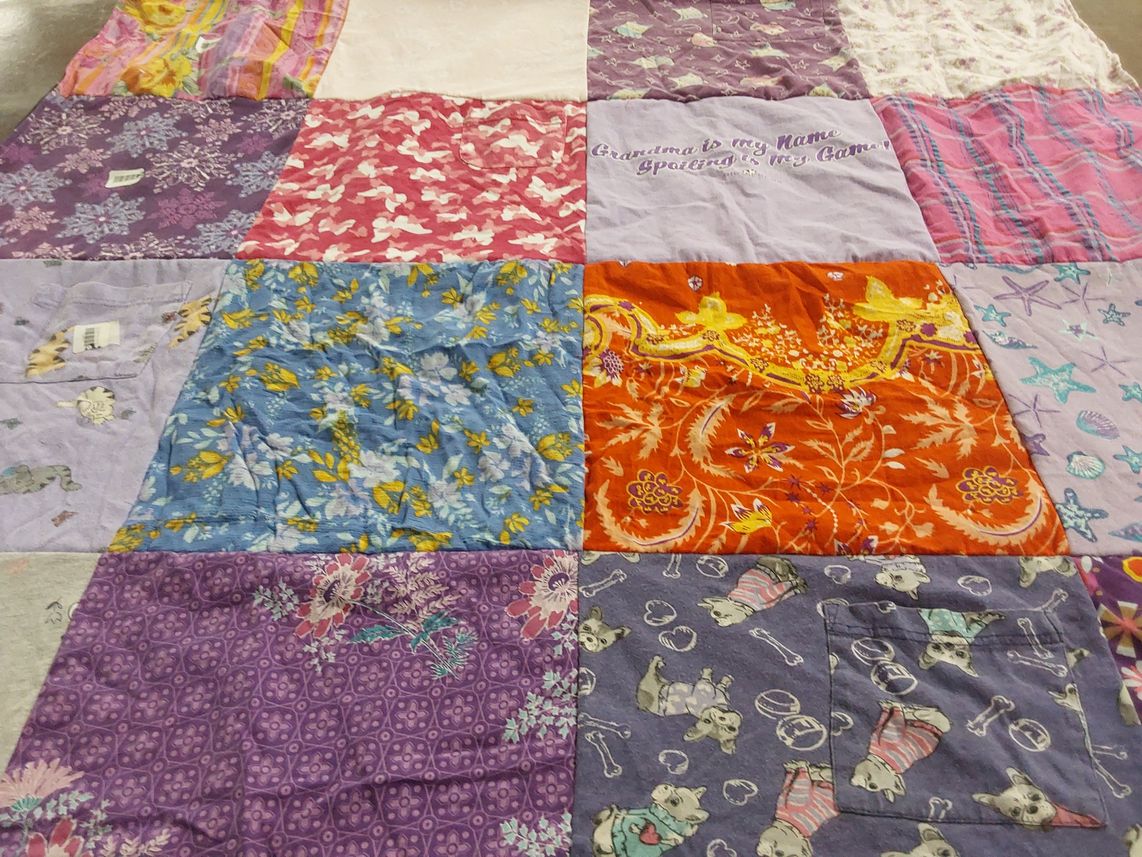 T-shirt quilt with quilting themes by Amanda from MO