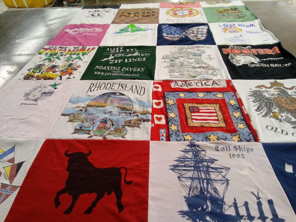 T-shirt quilt with travel, tourism themes by Connie from CA