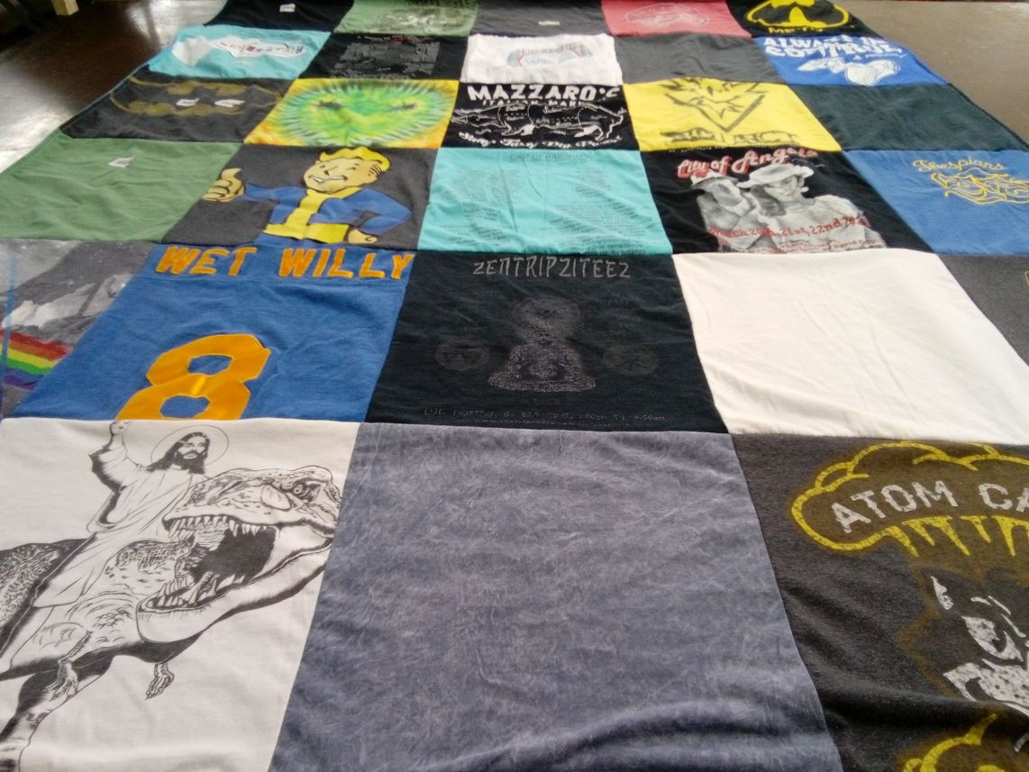 T-shirt quilt with comics, movies themes by Cara from AE
