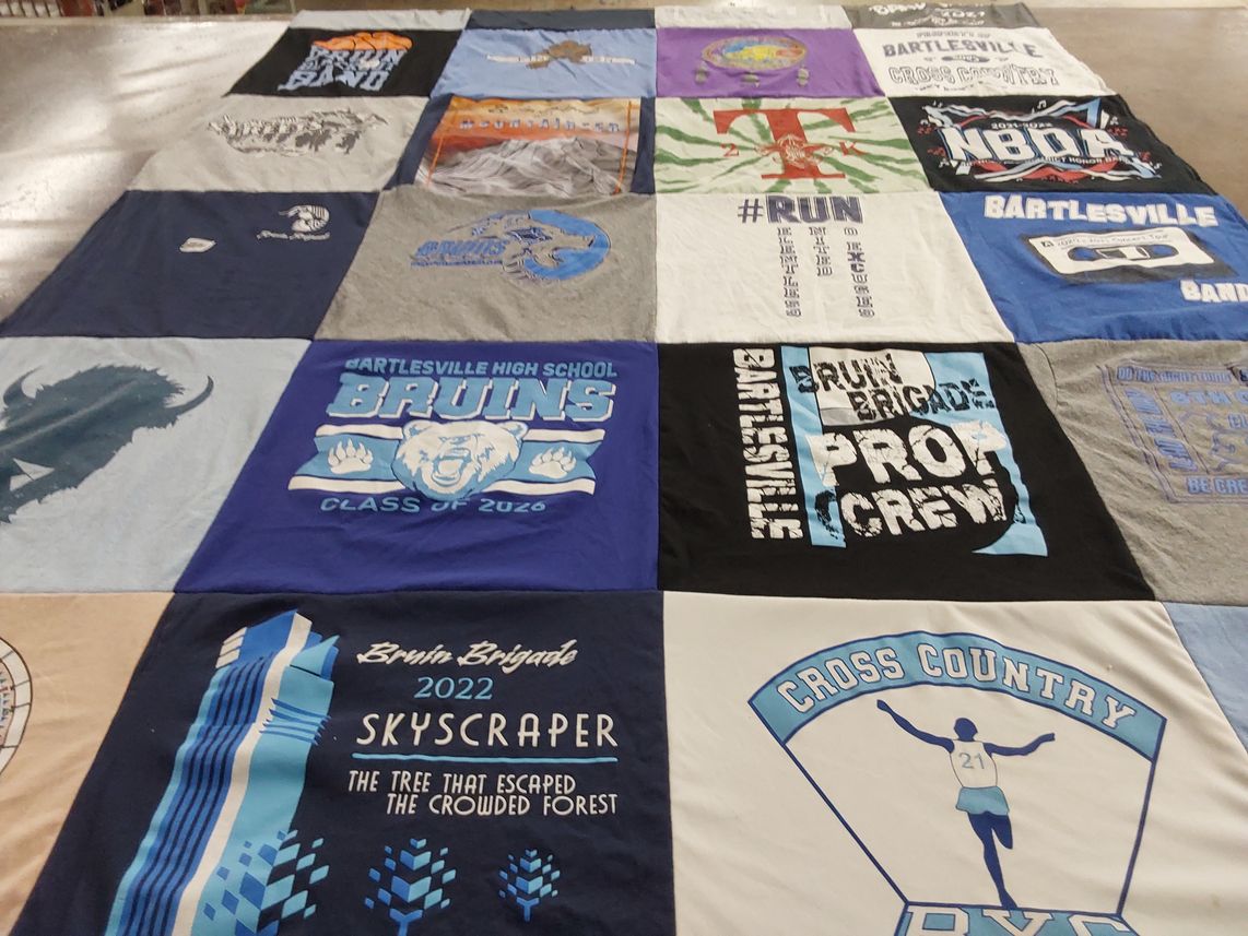 T-shirt quilt featuring bartlesville cross country by Amy from OK