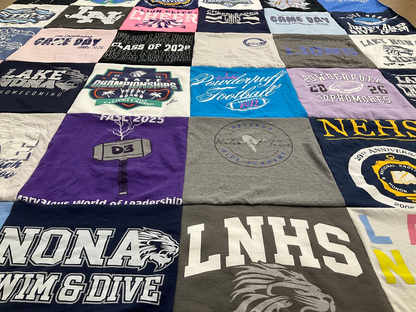 T-shirt quilt featuring lake nona high school swim and dive team, lake nona high school soccer team by Kimberly from FL